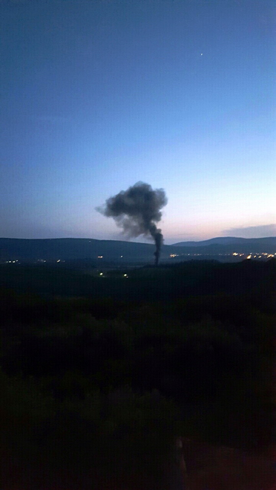Dim od paljenja guma iznad Lovanje